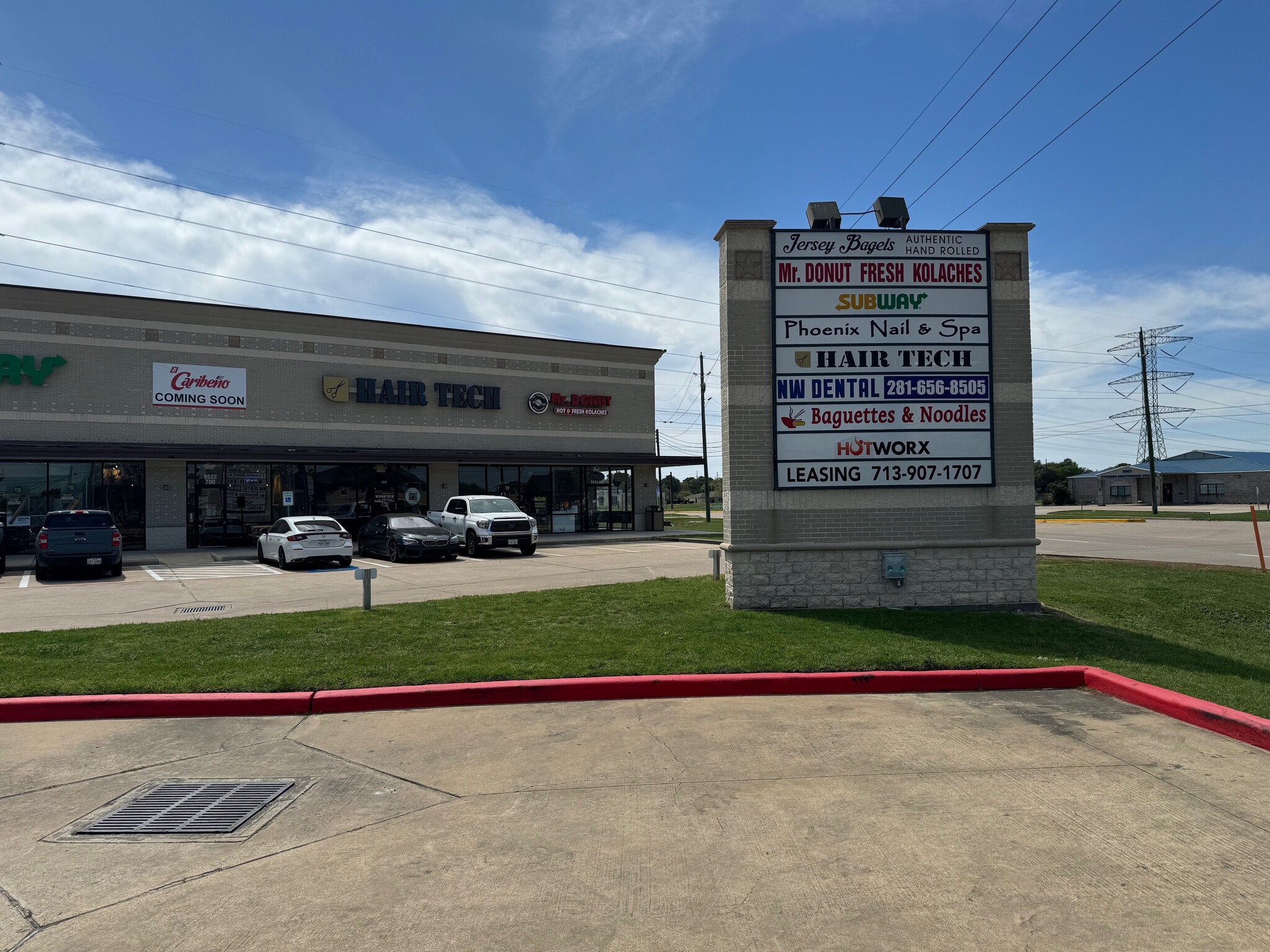 Eagles Landing monument sign with the retail center in the background