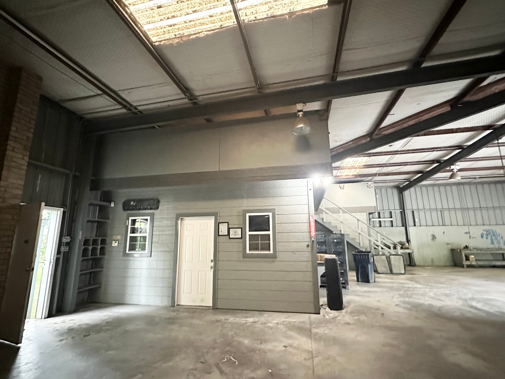 Interior office enclosure within the main warehouse at 13626 Ann Louise Rd