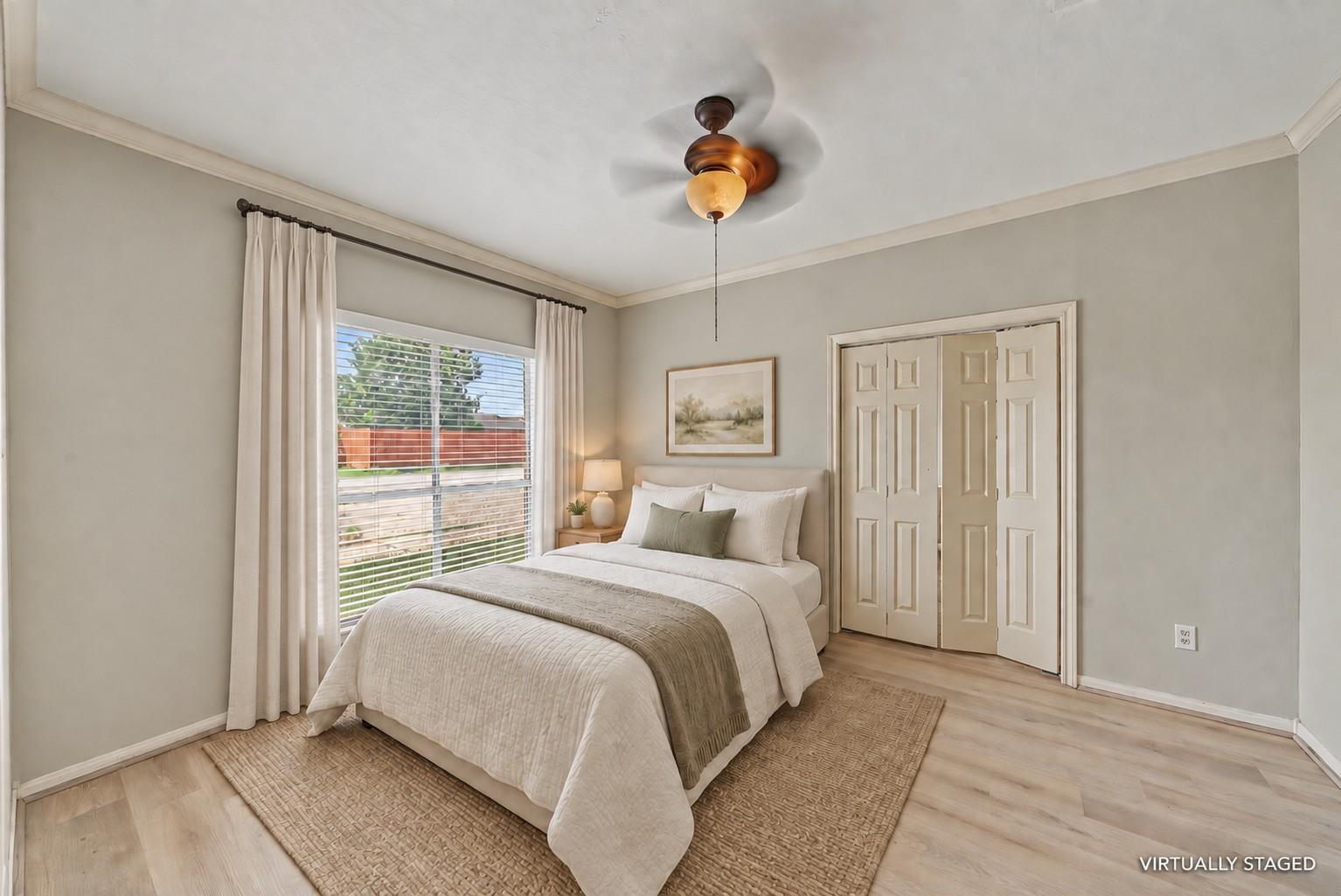 Virtually staged secondary bedroom at 1411 Guadalupe St