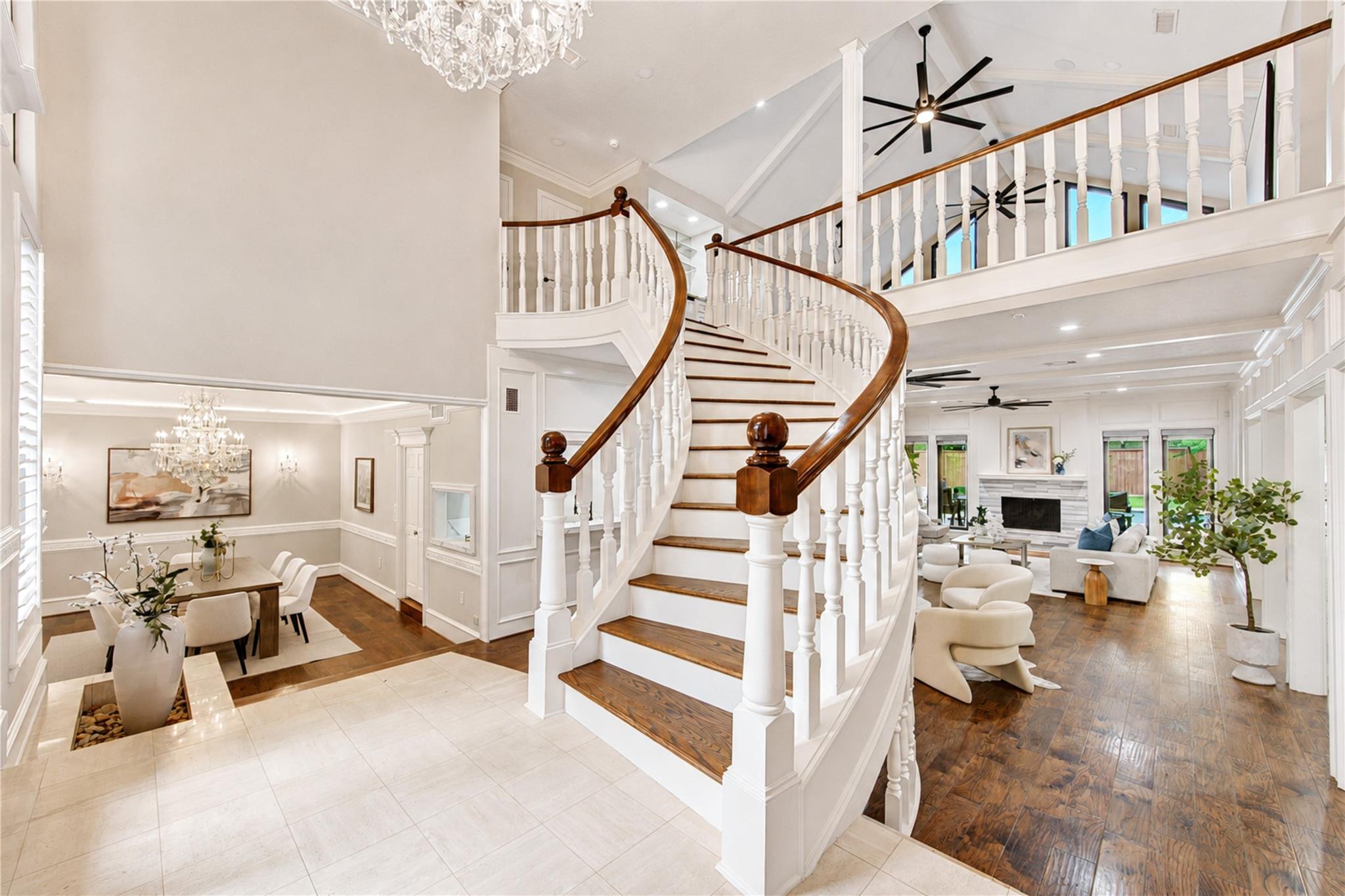 Formal entry with curved staircase at 19822 Summerset Way