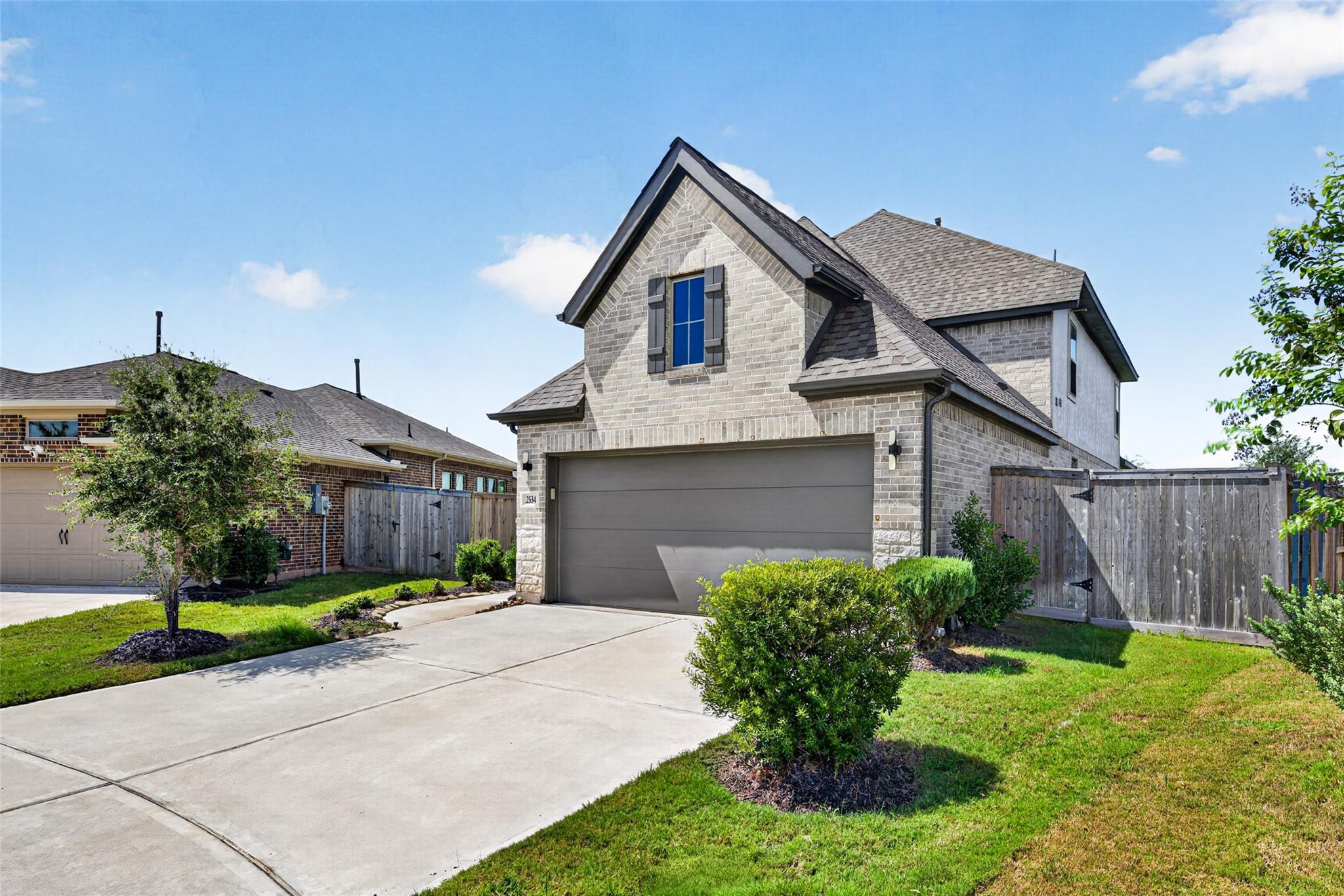 Angled front exterior of 2534 Alder Wood Ln