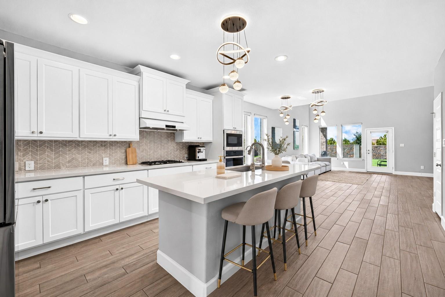 Open kitchen and living area at 2534 Alder Wood Ln