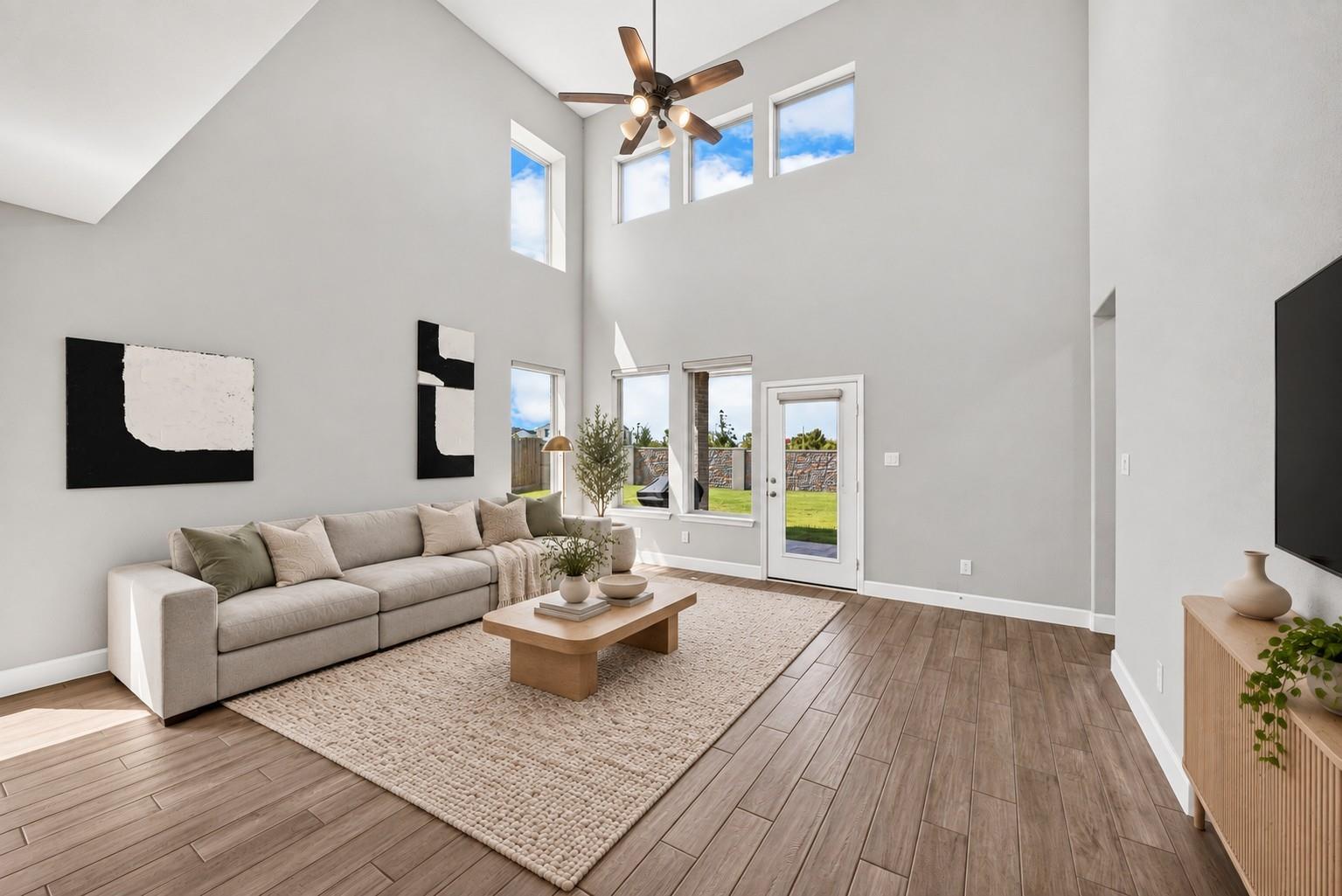 Two-story living room at 2534 Alder Wood Ln