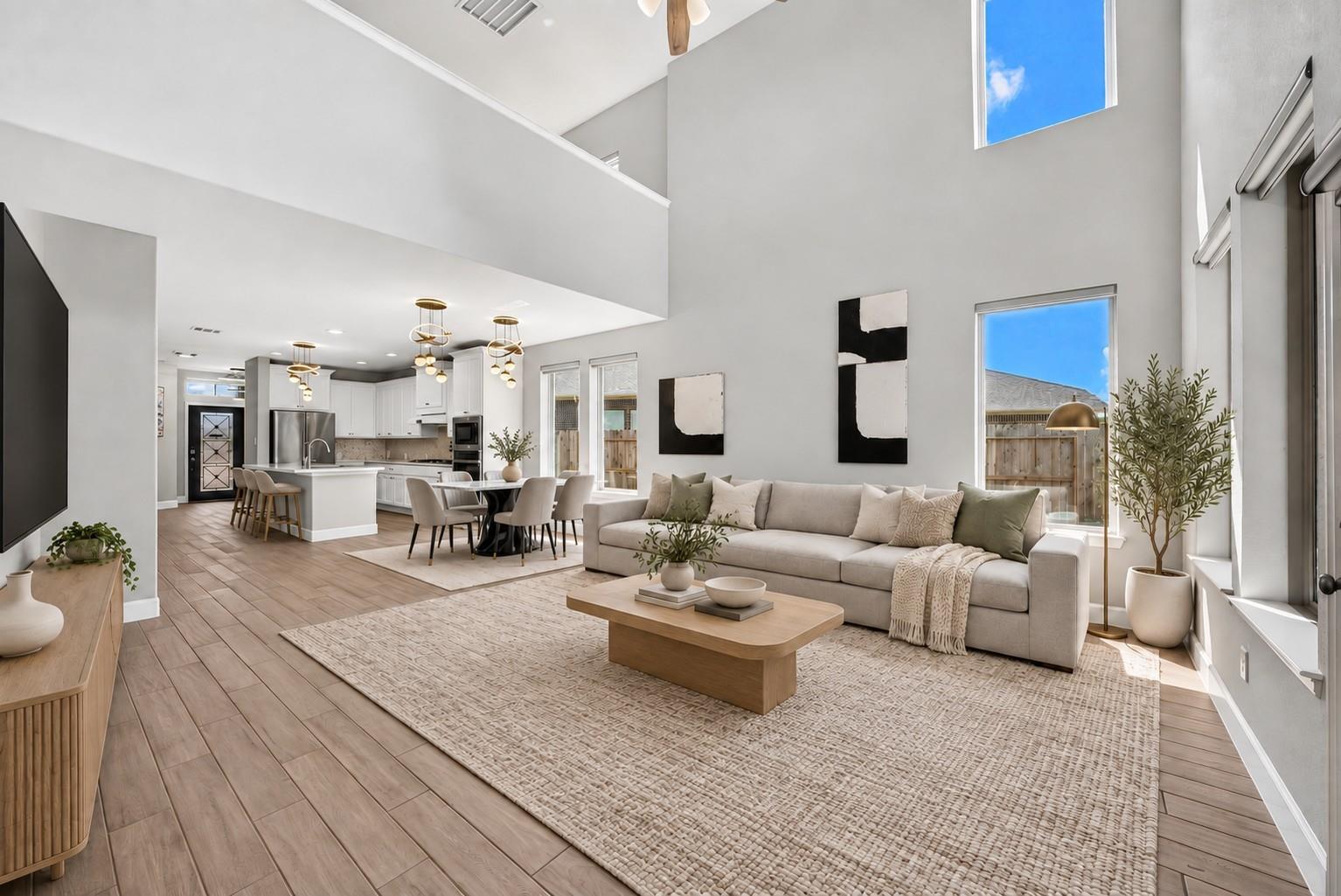 Living room and open kitchen at 2534 Alder Wood Ln