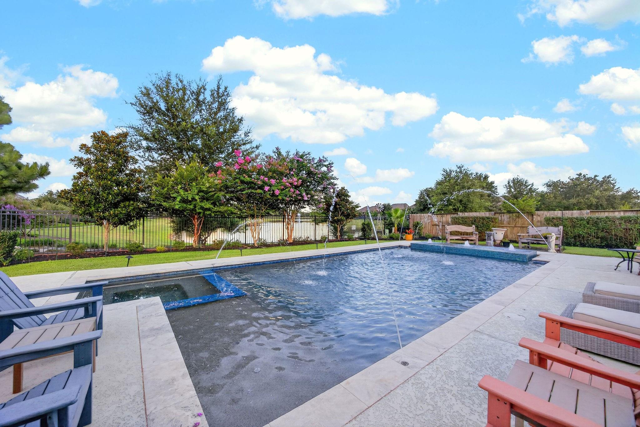 Pool and expansive deck at 2710 Merlin Way in Cane Island