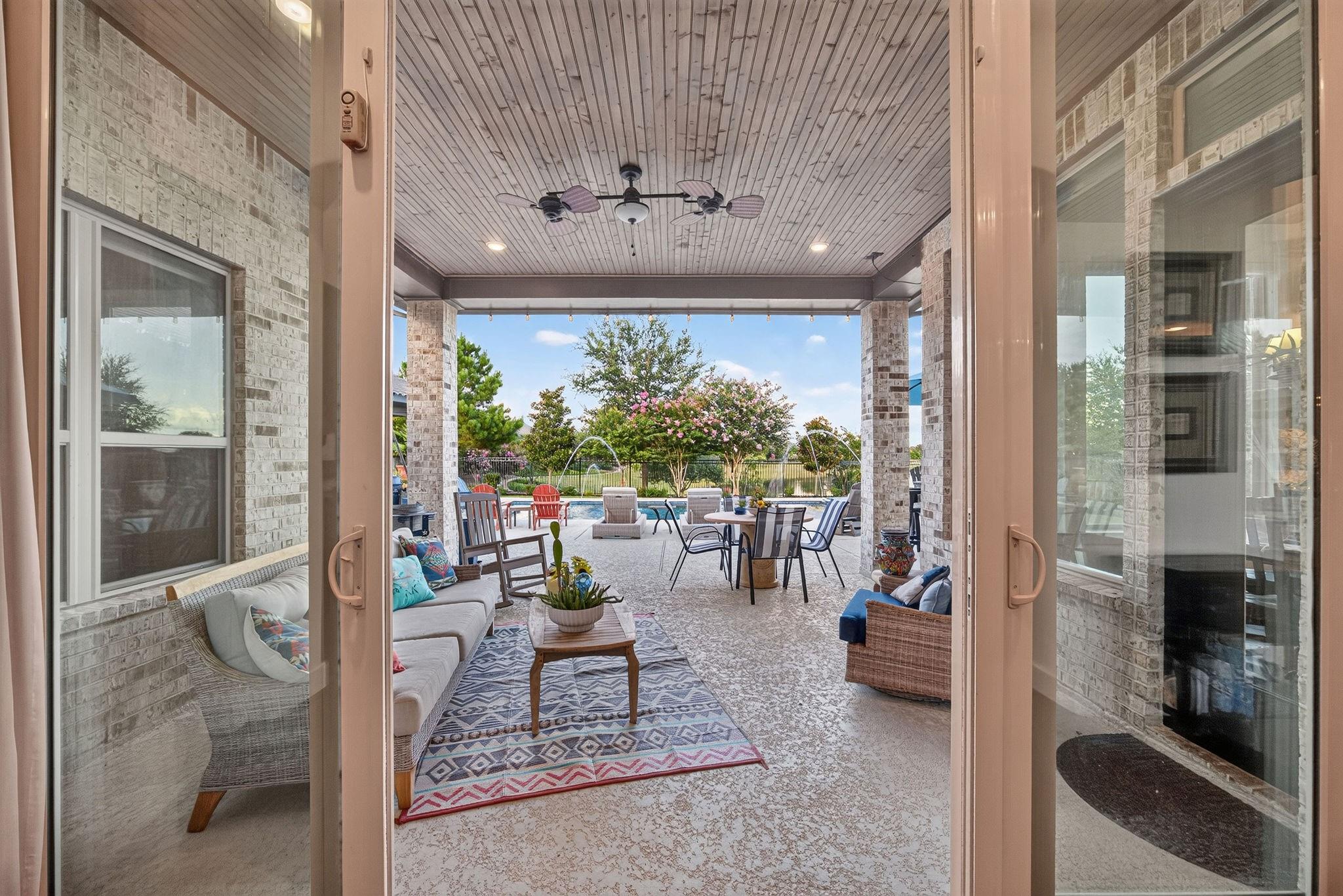 Covered patio with water views at 2710 Merlin Way
