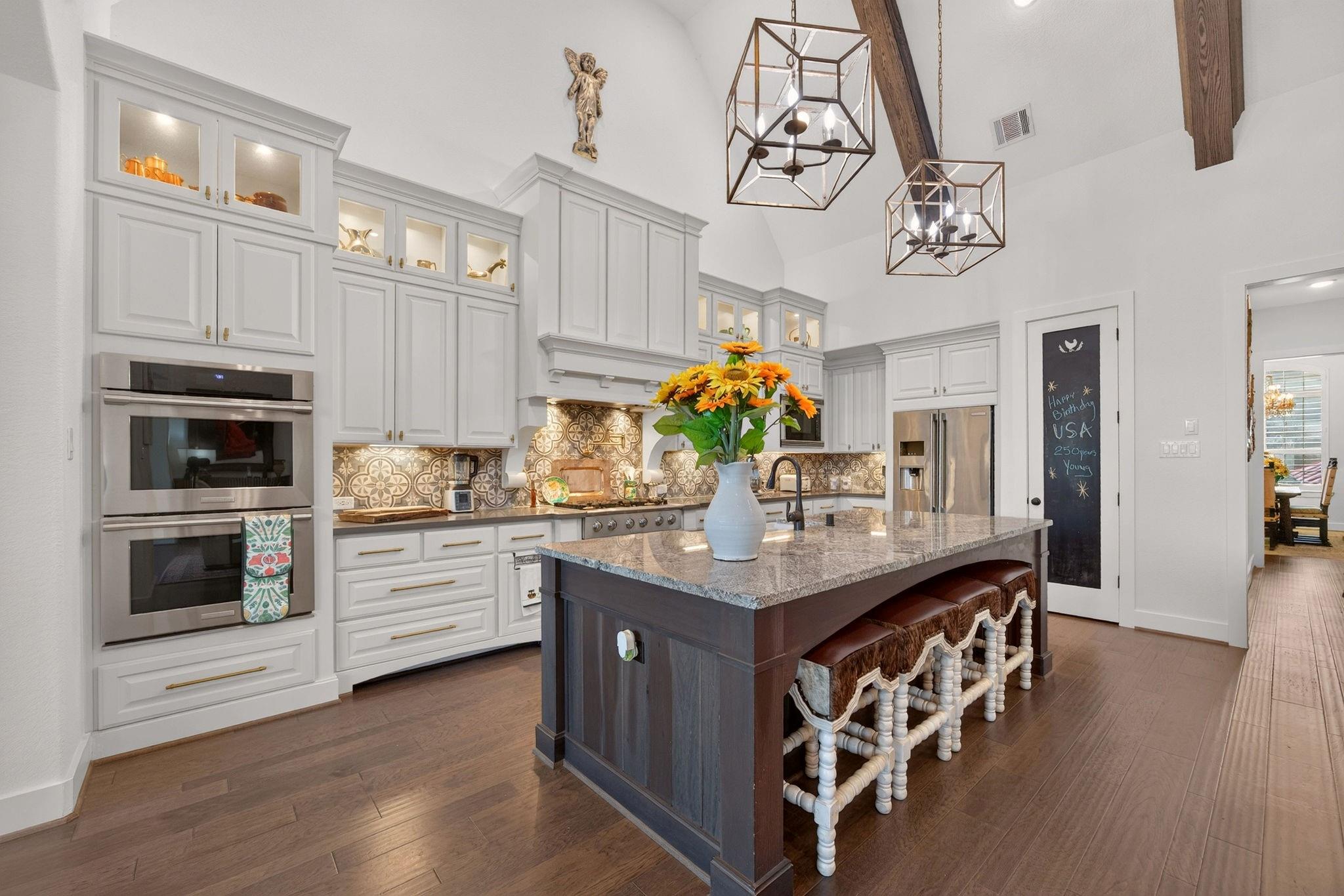 Gourmet kitchen with custom cabinetry at 2710 Merlin Way