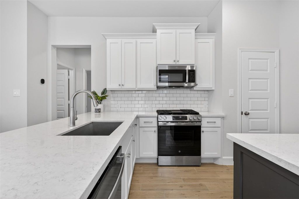 Bright kitchen with quartz countertops at 2867 Orange Leaf Dr
