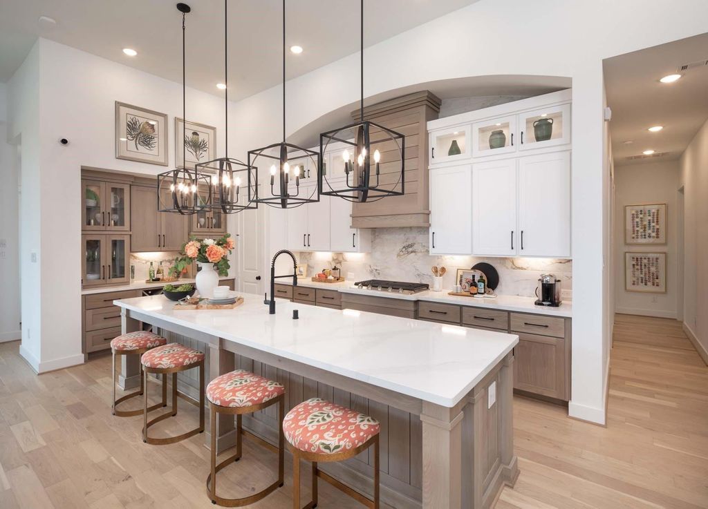 Gourmet kitchen with oversized island at 29623 Apple Glen Court