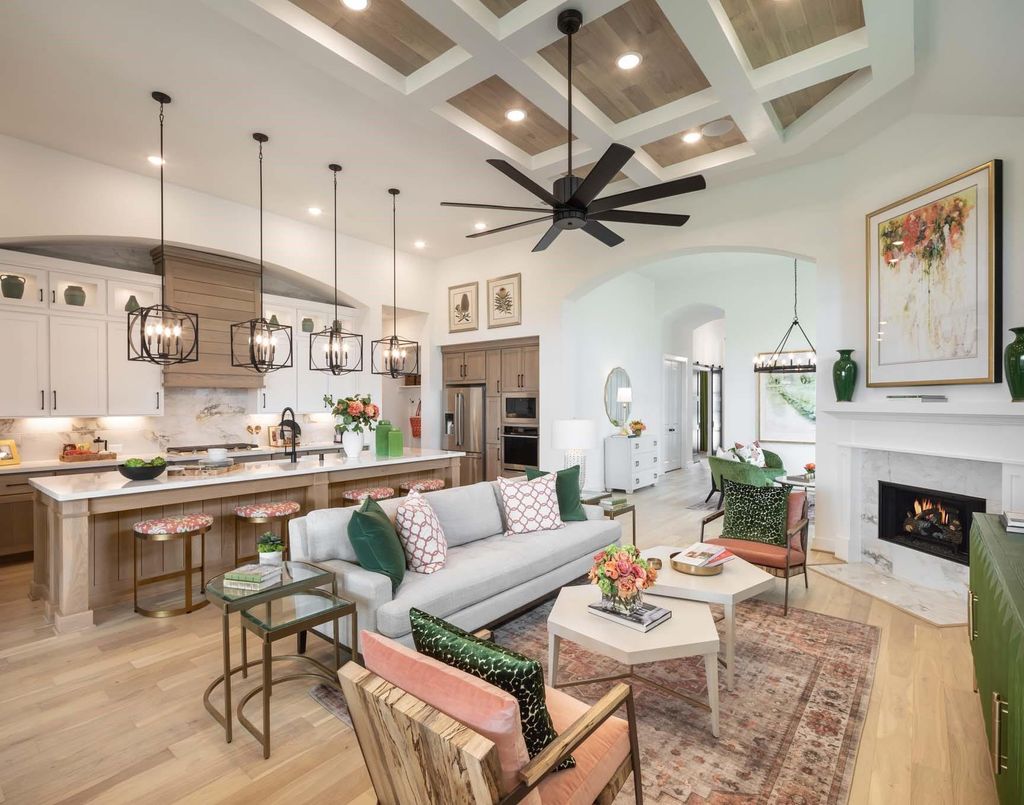 Great room with coffered ceiling and fireplace at 29623 Apple Glen Court