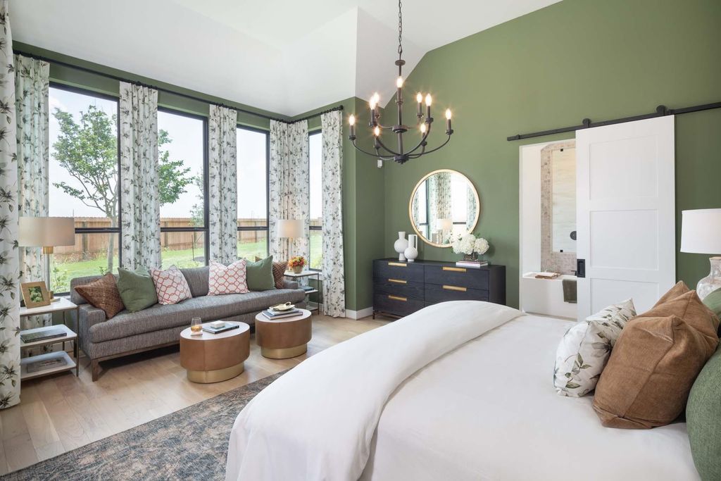 Primary bedroom with large windows at 29623 Apple Glen Court