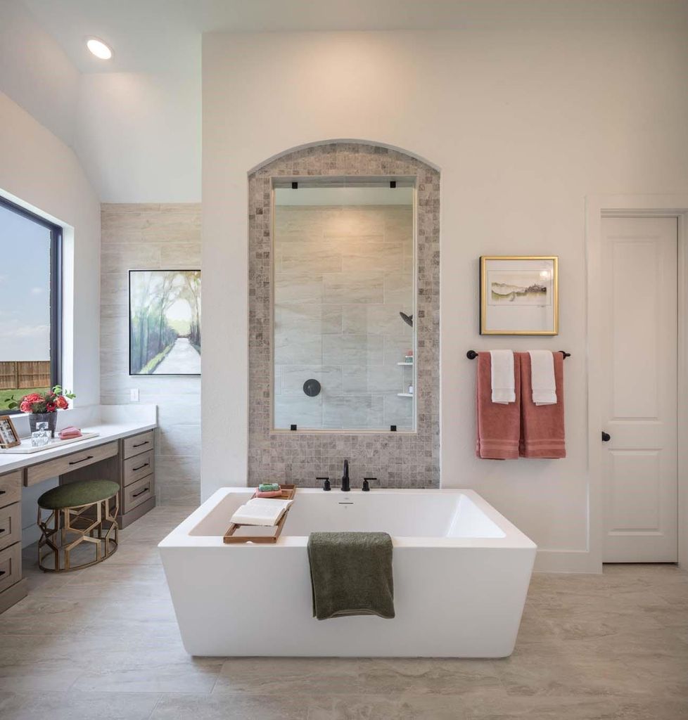 Primary bathroom with soaking tub and walk-in shower at 29623 Apple Glen Court