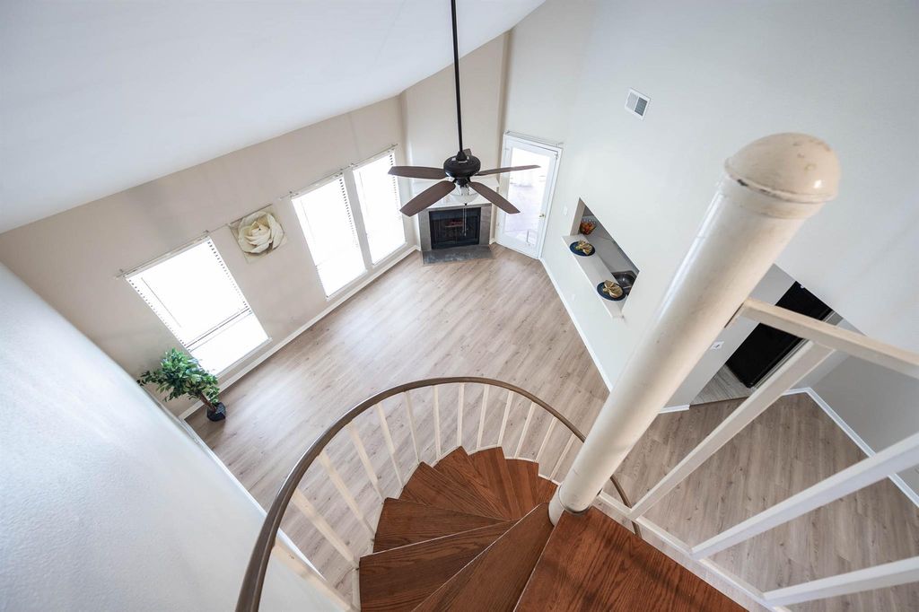 View from the spiral staircase over the living room at 4144 Greystone Way Unit 105