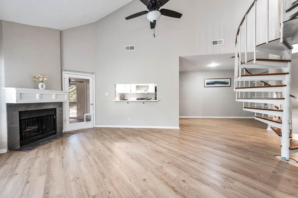 Living room with fireplace at 4144 Greystone Way Unit 105