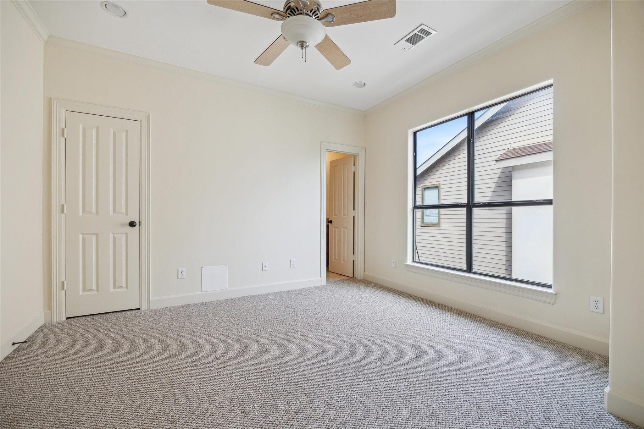 Third-floor secondary bedroom at 415 Tuam Street