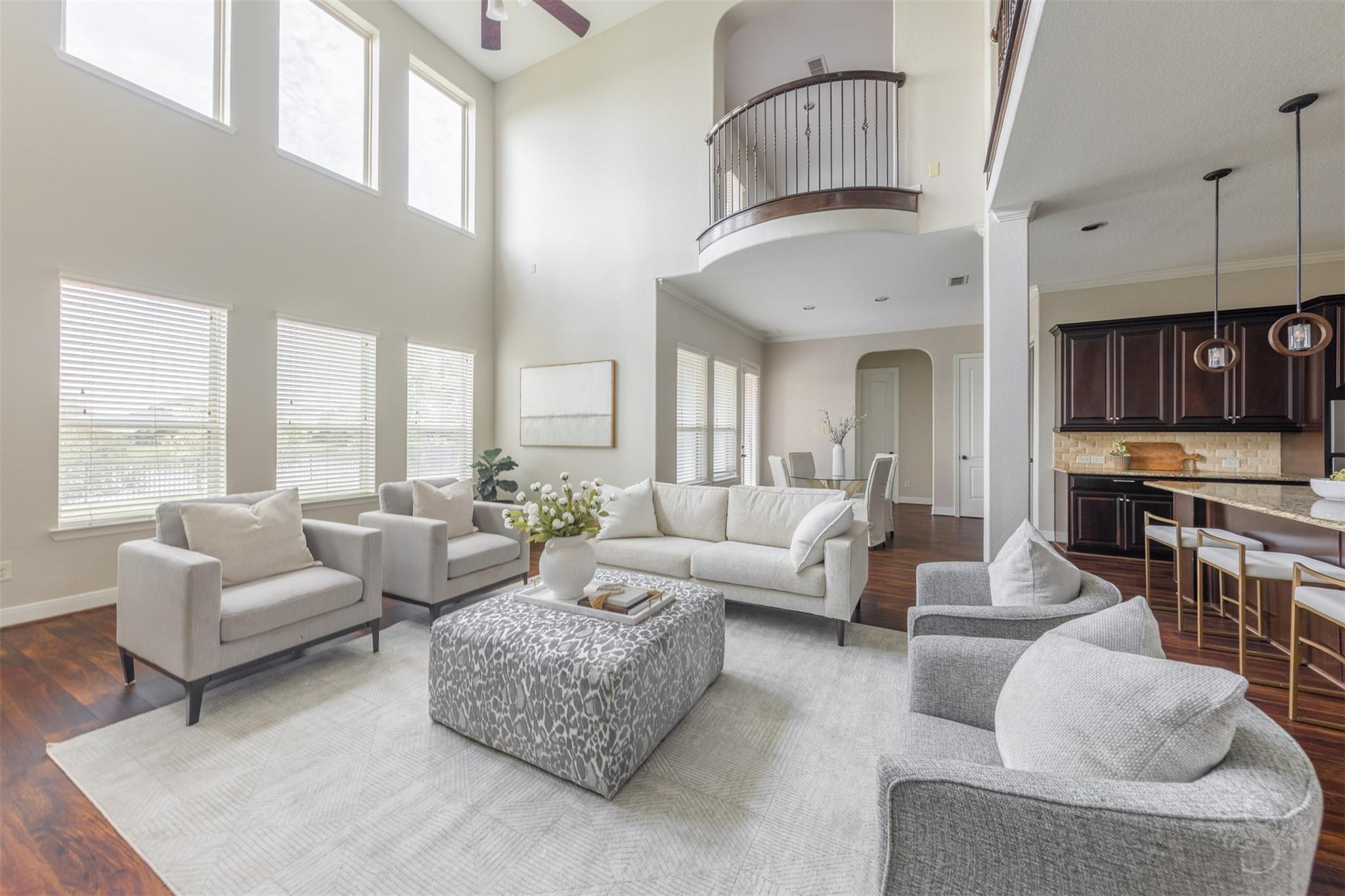 Open family room, kitchen and breakfast area at 5026 Quiet Falls Lane