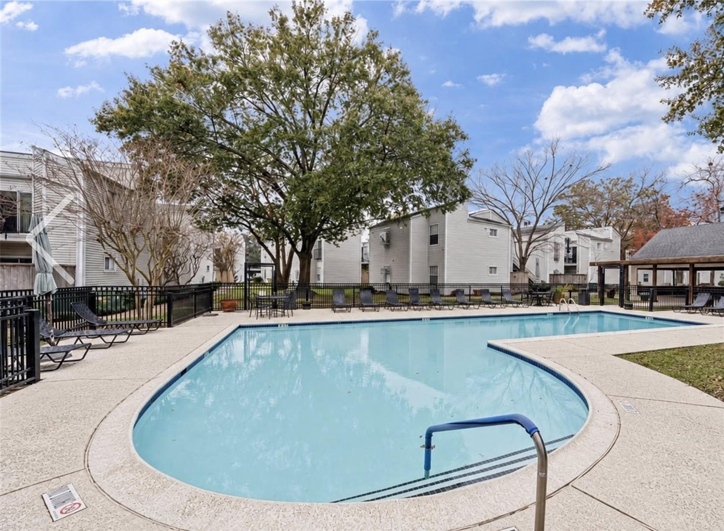 Community swimming pool at Elm Grove Condominiums