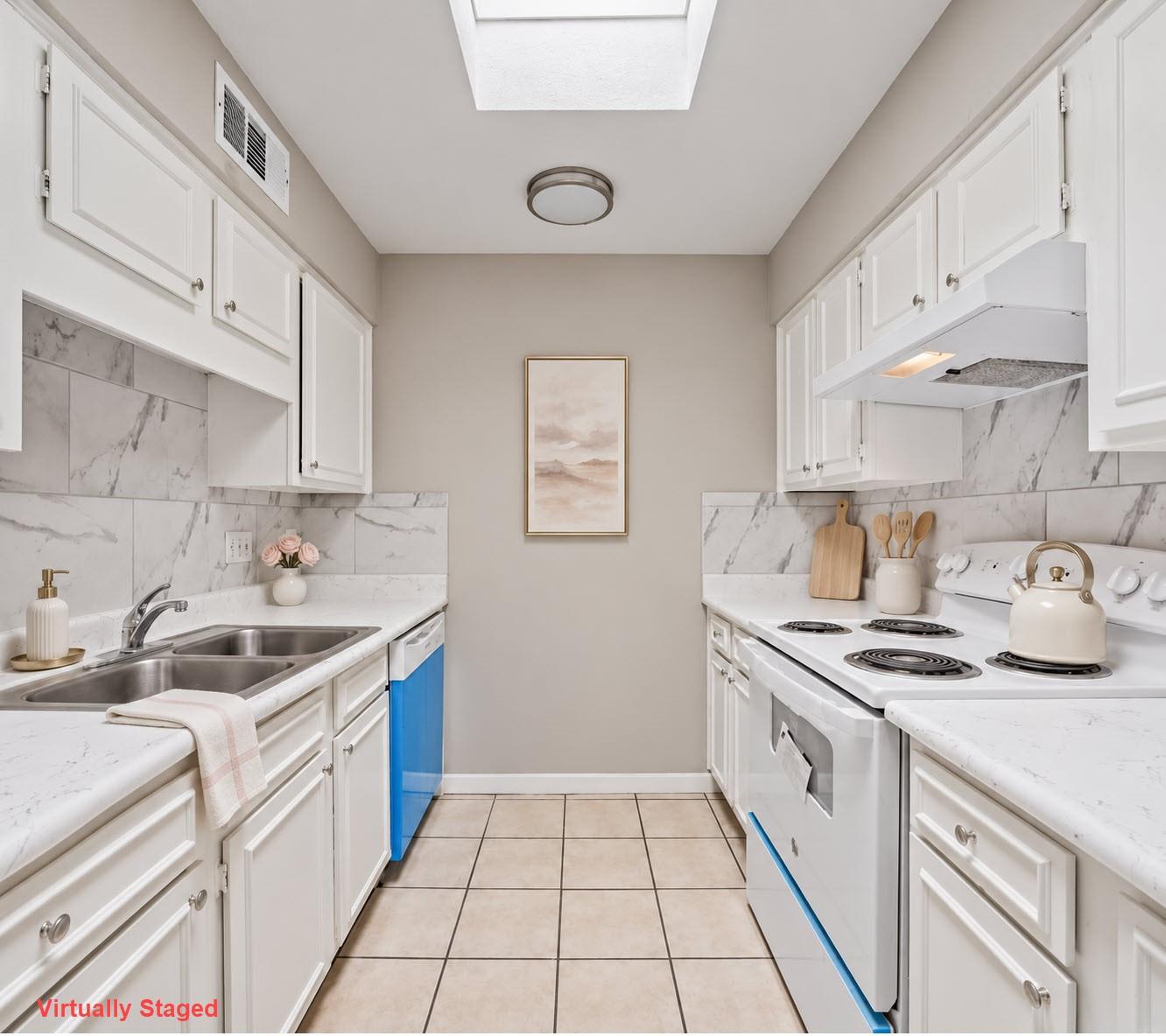 Virtually staged kitchen at 9809 Richmond Avenue Unit E14