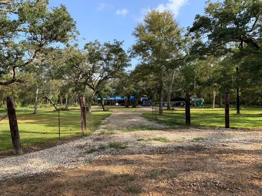 Gravel entrance and mature trees at 0 Private Road 648 St in Cedar Lake