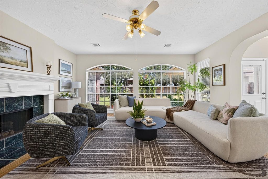 Family room with fireplace and backyard views at 2819 Gray Moss Ct