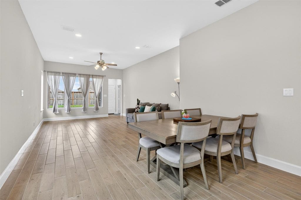 Open dining and living space at 2867 Orange Leaf Dr