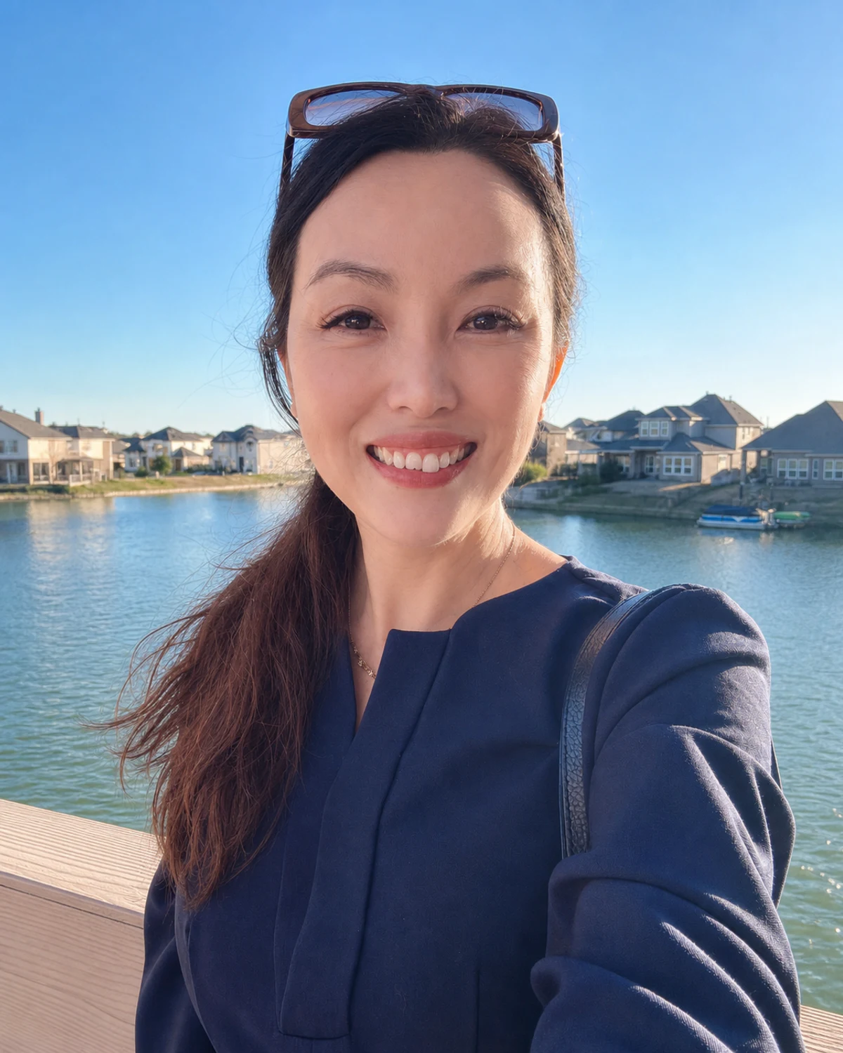 Joyce Tang in a Greater Houston waterfront residential community