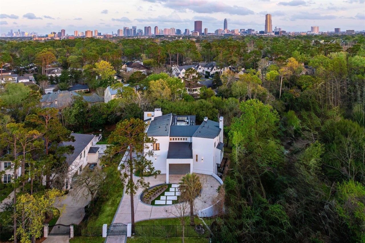 Aerial view of 10663 Memorial Drive and the surrounding tree canopy