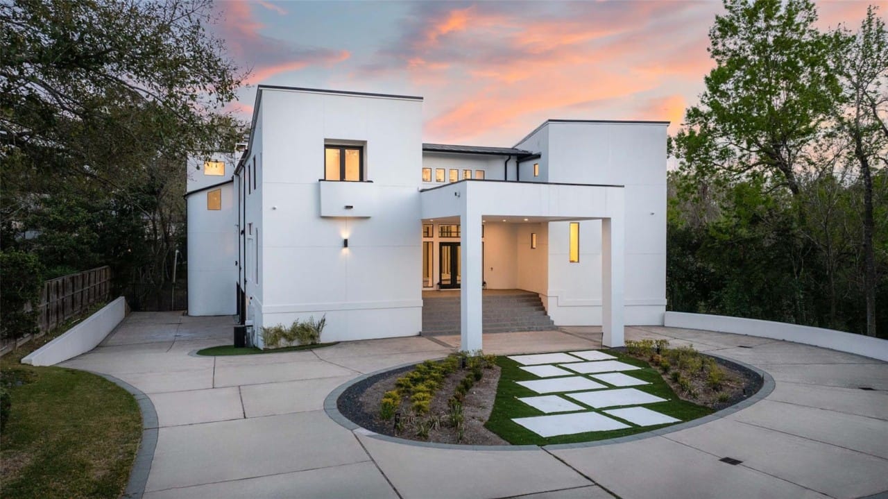 Front exterior and circular driveway at 10663 Memorial Drive