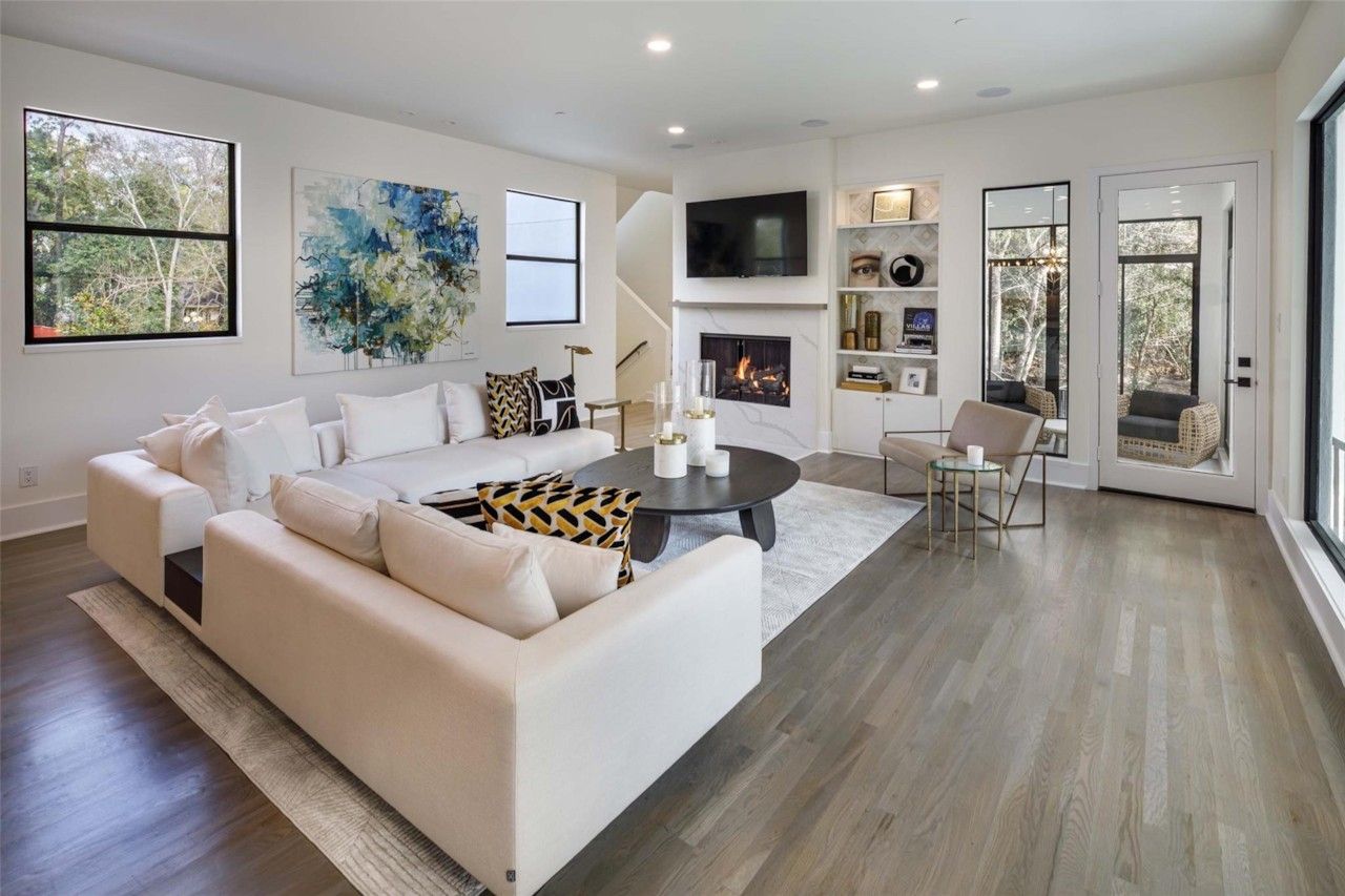 Open kitchen and living room with fireplace