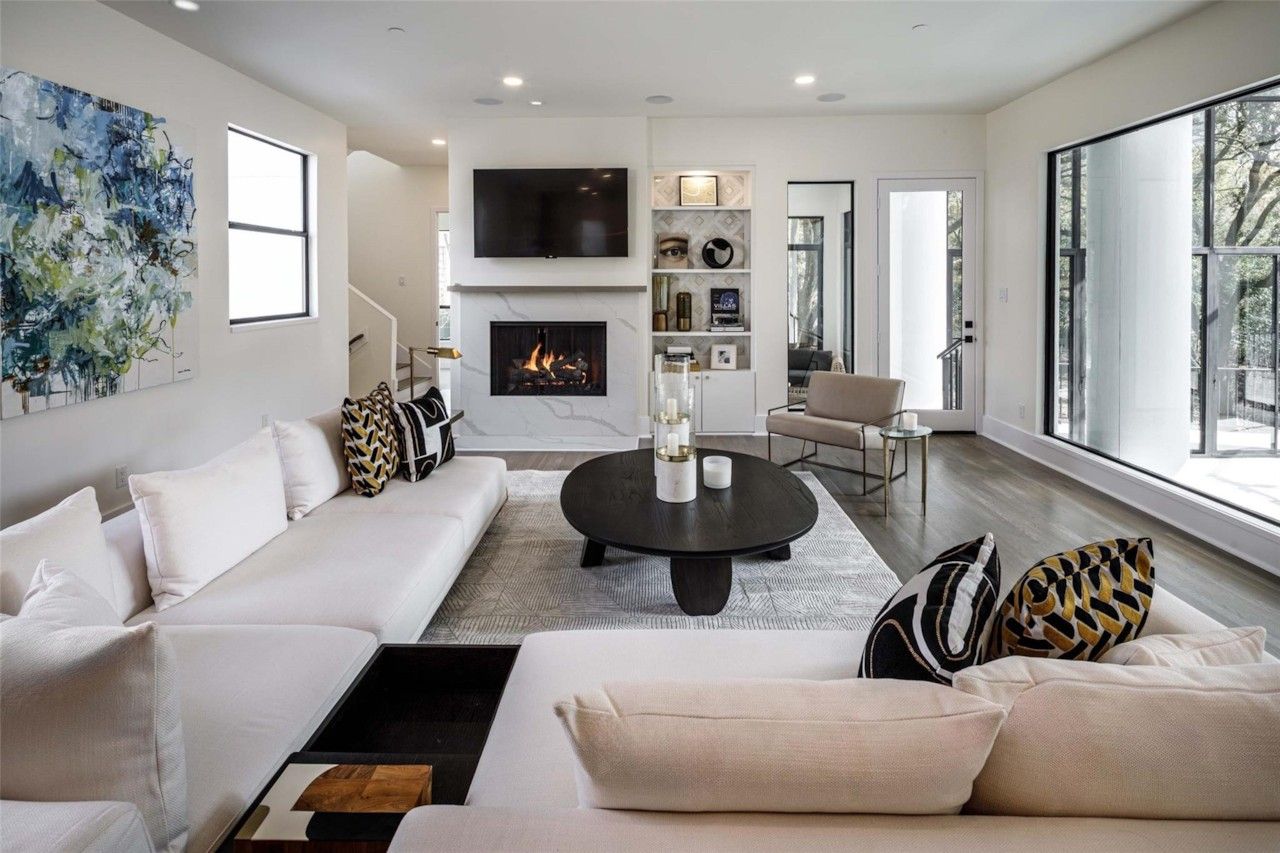Main living room with fireplace and garden views