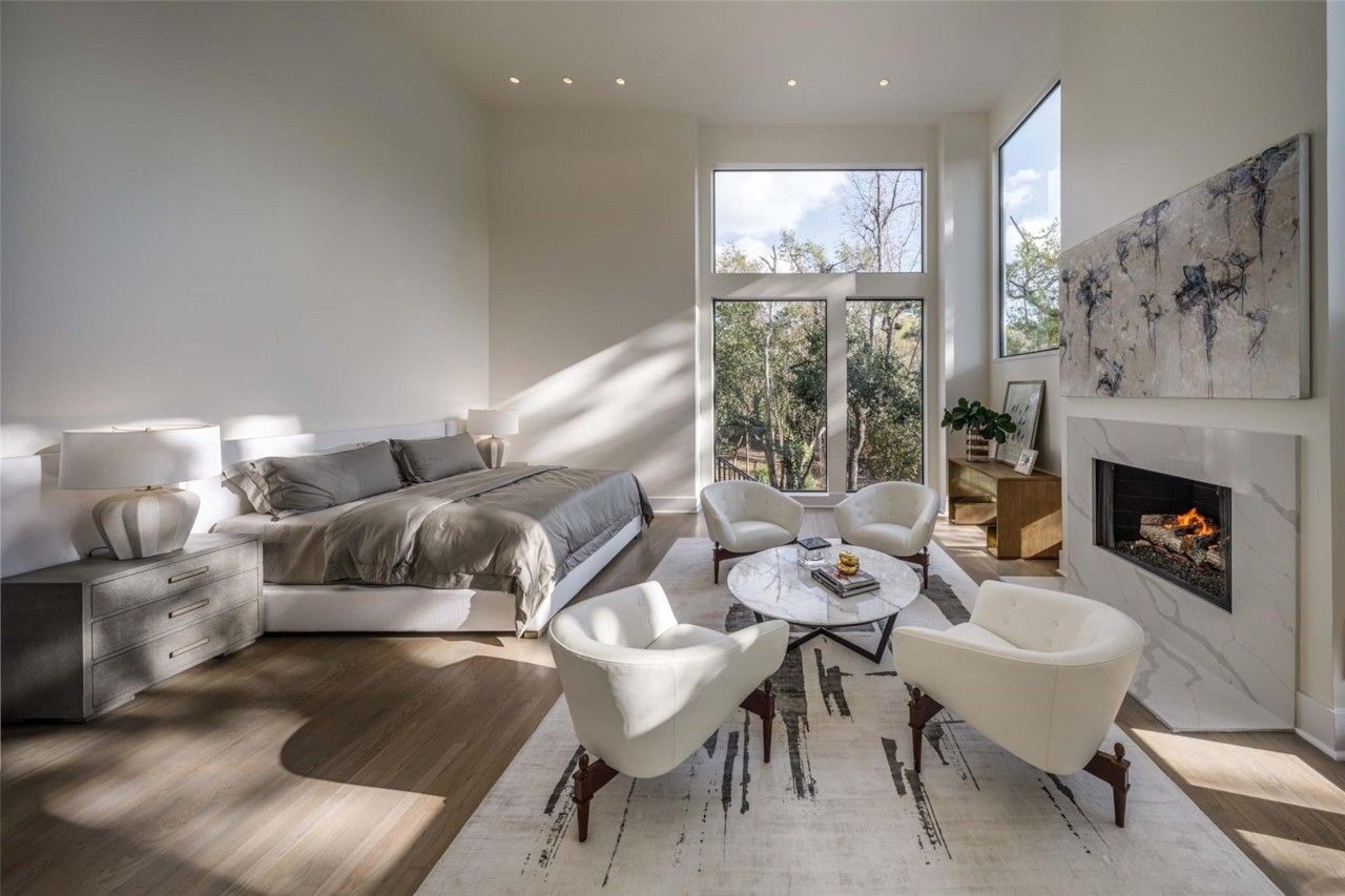Bright bedroom sitting area with fireplace