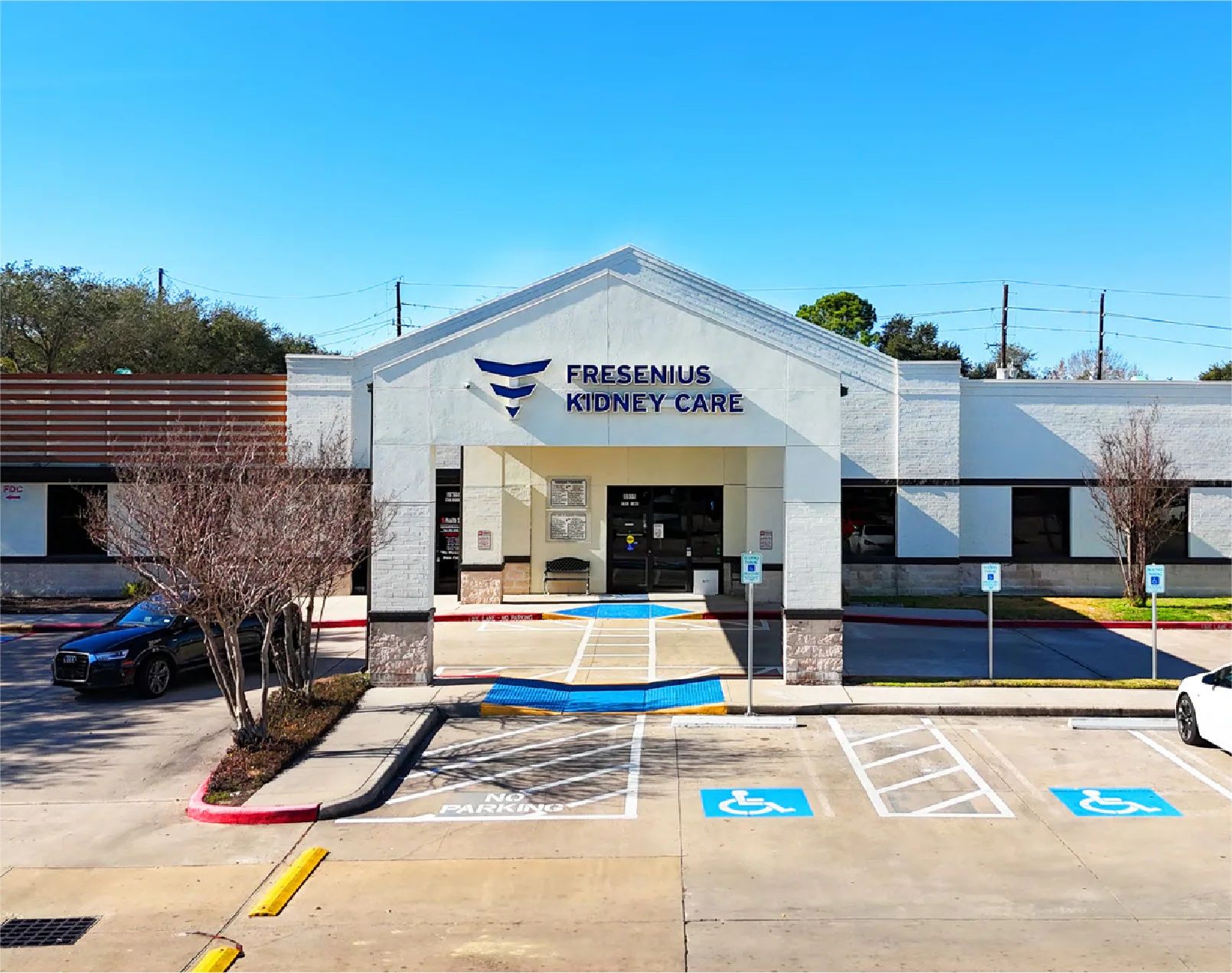 Front exterior of Copper Grove Corner and Fresenius Kidney Care at 8925 N Highway 6