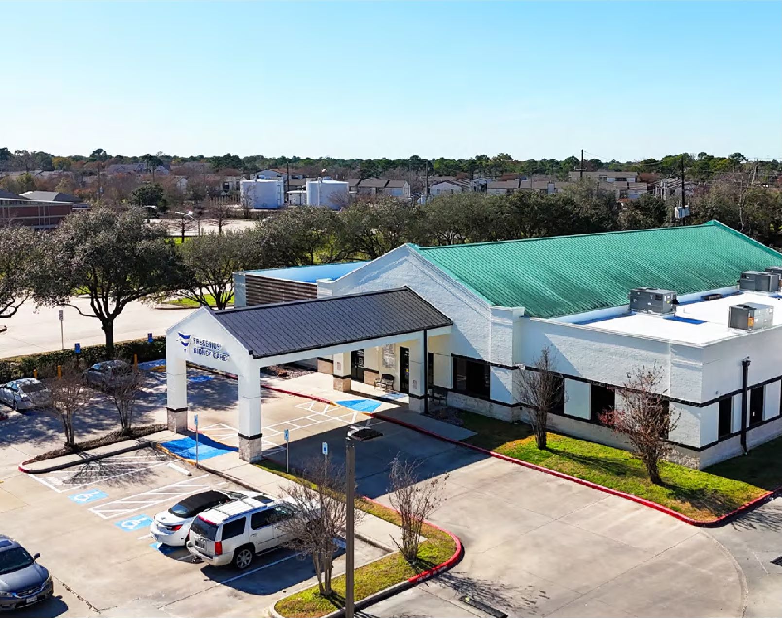 Aerial side view of the Copper Grove Corner medical office building and parking areas